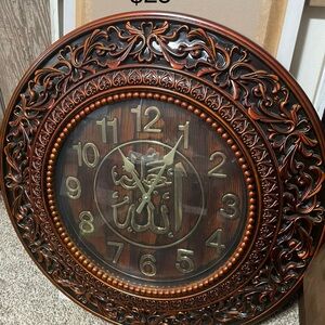 Wall clock size bid and brown color